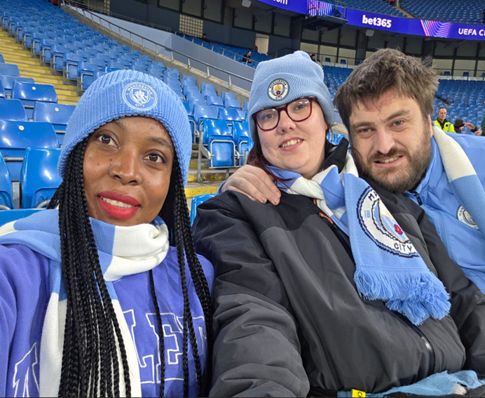 ALC team members at a Manchester City match, a proud diverse team